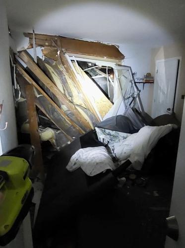 Car crashes into Coeur d'Alene apartment, nearly kills mom and 6-year-old son